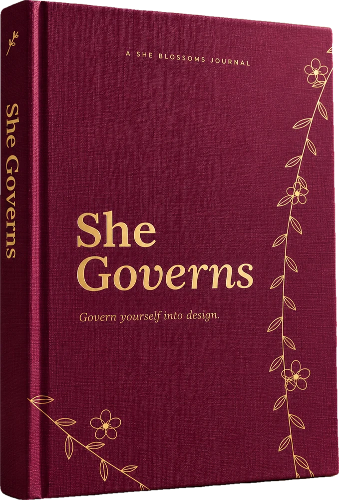 The She Governs journal in plum linen with a gold vine design